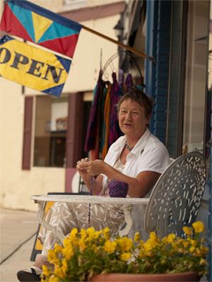 Woman at outdoor table